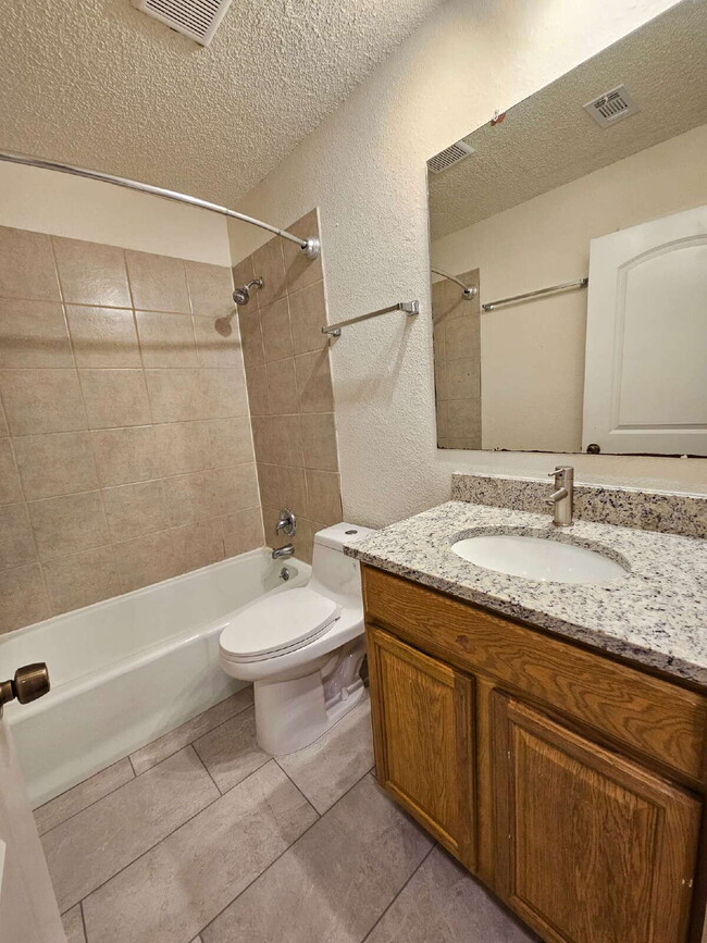 Building Photo - Charming 4-Bedroom Retreat with Cozy Fireplace in Vibrant Austin Neighborhood!