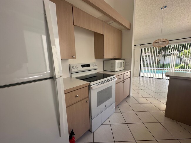 Building Photo - Luxurious 3 Bedroom Oasis with Pool and Beach Access AVAILABLE NOW!