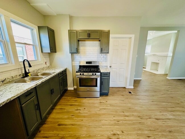 Building Photo - Lease_ Fully Remodeled 3 Bedroom 1 1/2 Bath Welcome Section 8 Call 313-429-3244