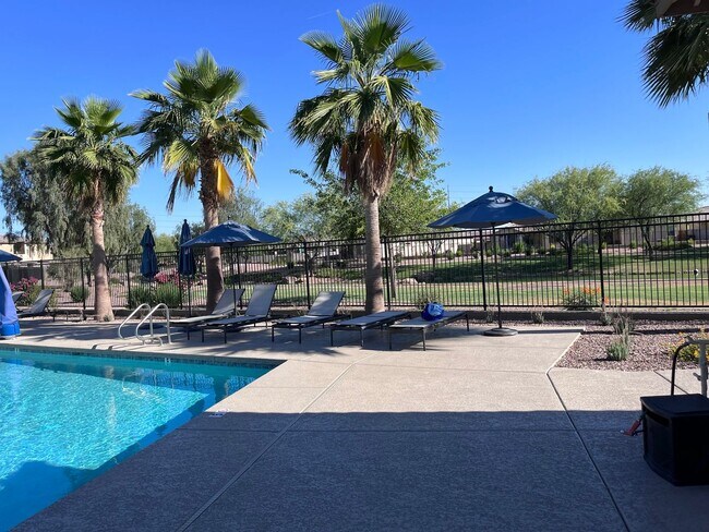 Building Photo - TOWN HOME WITH COMMUNITY POOL , GATED COMM...