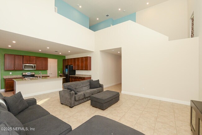 Building Photo - 10976 SW Tessili Wy