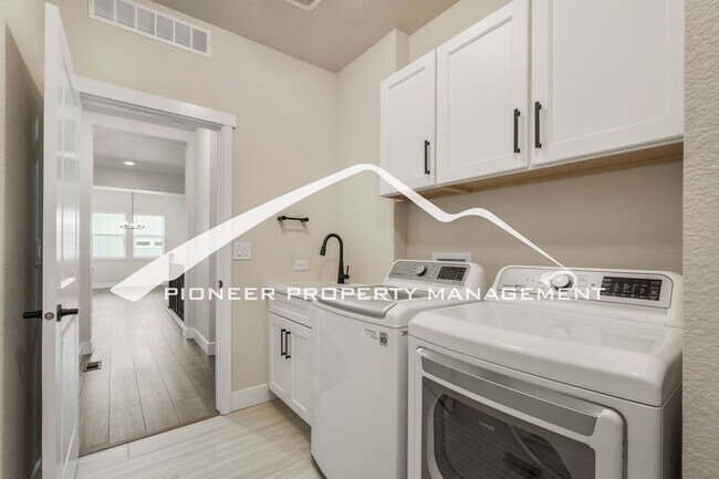 Building Photo - Main Floor Primary Home in Flying Horse with 5 Bedrooms, Gourmet Kitchen, Finished Basement & 4-C...
