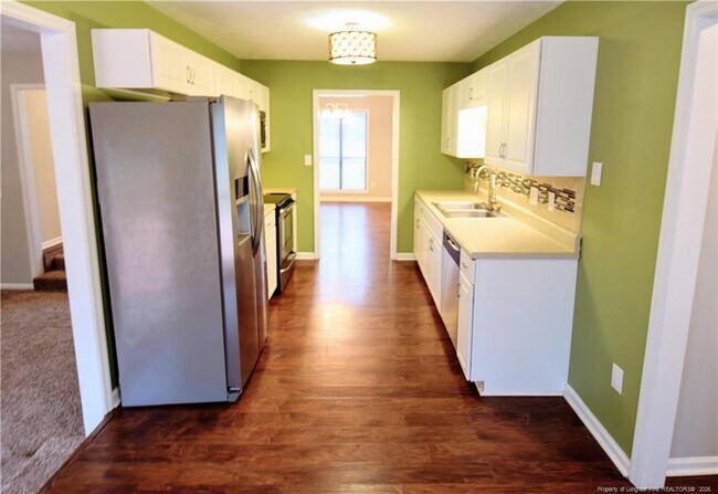 Building Photo - 6933 Woodmark Dr