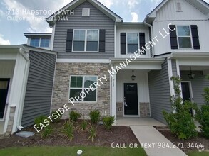 Building Photo - Come see this lovely townhouse in a desira...