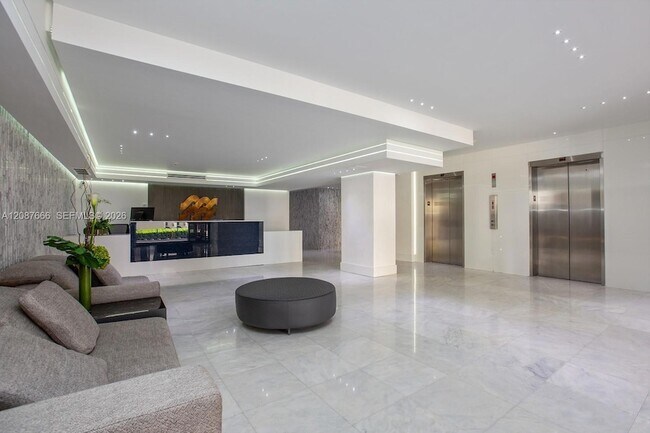 Building Photo - 6423 Collins Ave