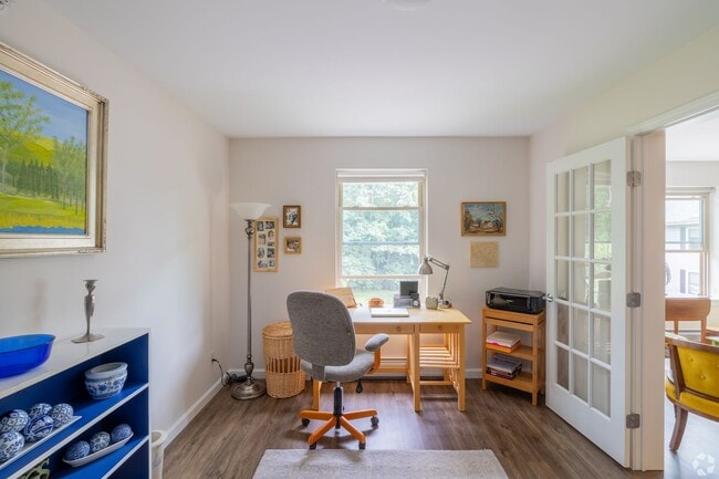 Building Photo - One Bedroom plus Den with a view that's ha...