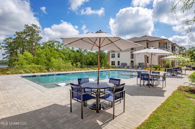 Building Photo - Fully furnished luxurious waterfront condo at The Inlet!