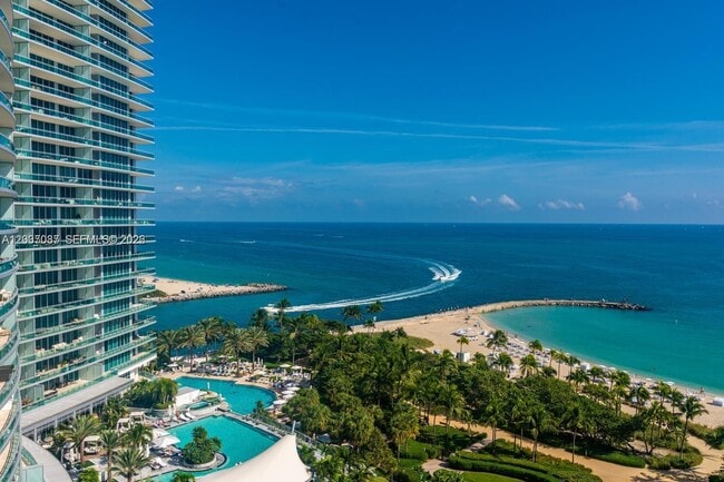 Building Photo - 10275 Collins Ave