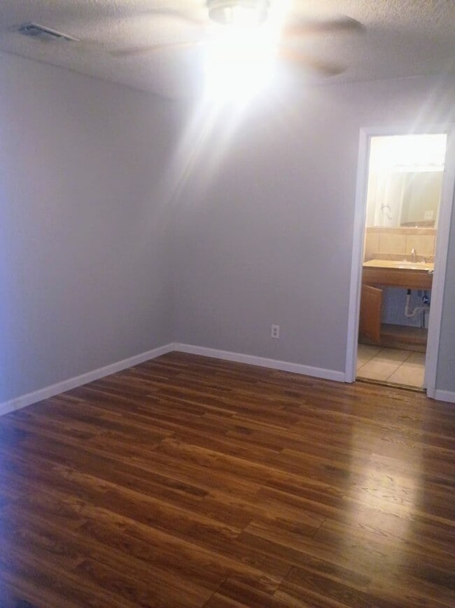 Building Photo - Updated 3/2 Home with 2-Car Garage + Air-Conditioned Workshop!