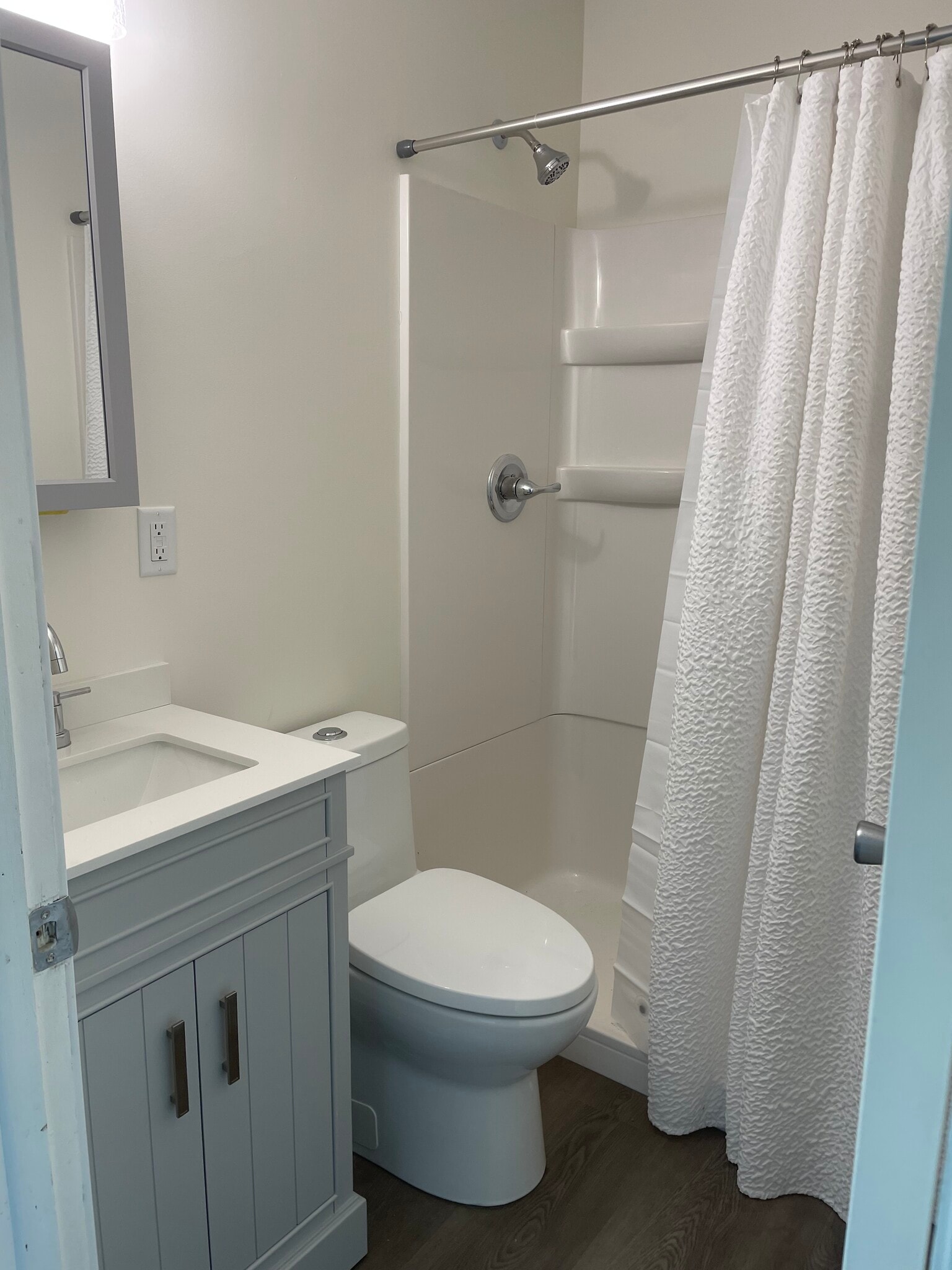 Shower vanity and stool all new. - 5223 Birchmont Dr NE