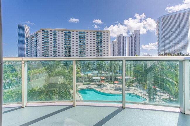 Building Photo - 19380 Collins Ave