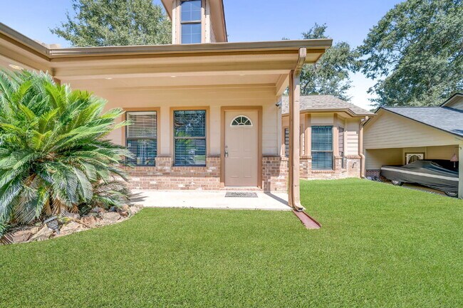 Building Photo - Live just steps from Lake Conroe in this beautifully maintained 3-bedroom, 2-bath home located in...