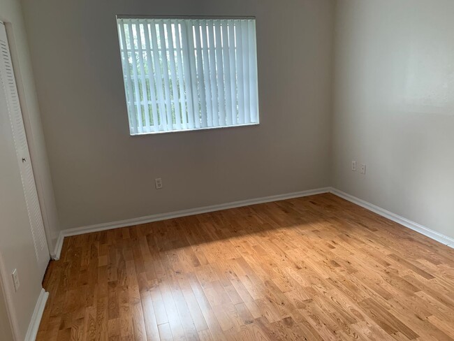 Building Photo - 3221 Sabal Palm Manor