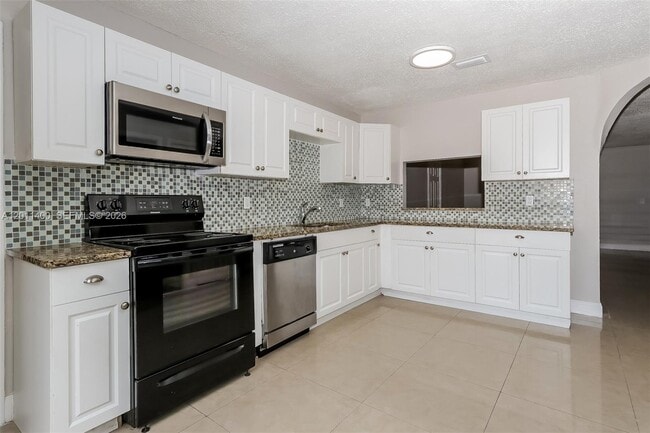 Building Photo - 6126 Arcade Ct