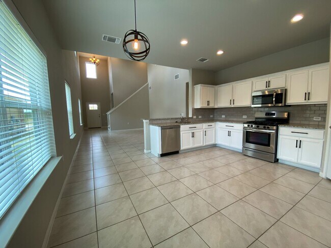 Building Photo - Stylish Southeast Austin Two-Story with Open Living, Modern Kitchen, and Flexible Spaces