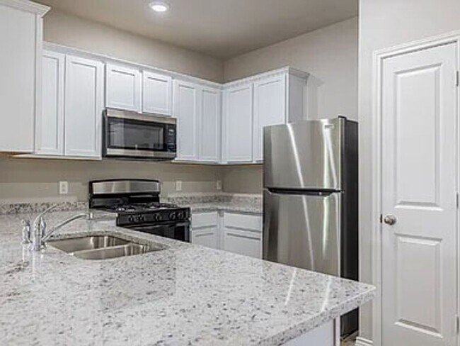 Building Photo - **Discover Elevated Living at Hunters Ranch!**