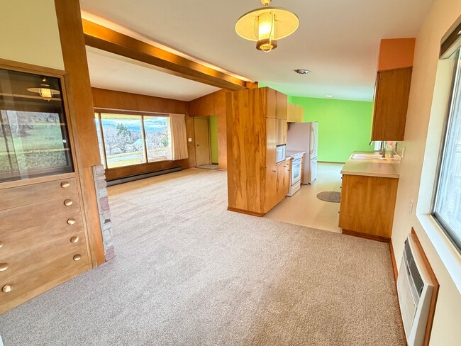 Building Photo - Country like setting! Spacious 3+ bed/ 1.5 bath house with garage, large yard, private deck and a...