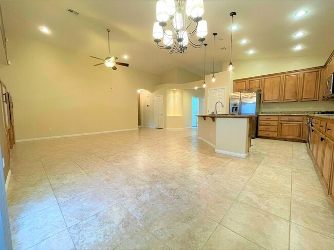 Building Photo - Vaulted Ceiling single-story home in a gat...