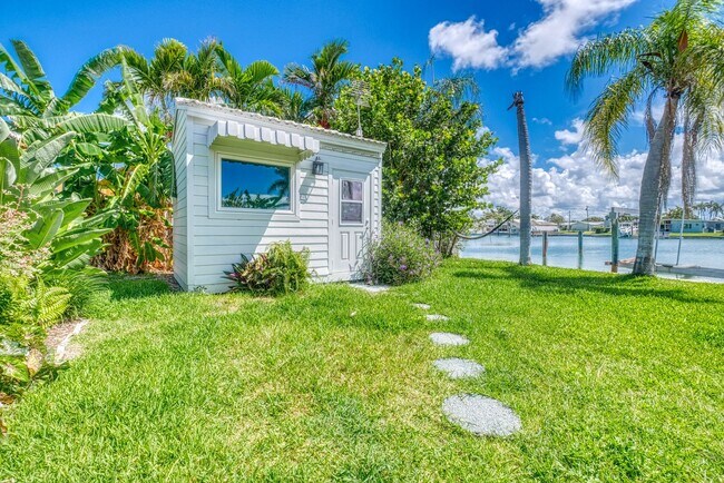 Building Photo - Treasure Island Three Bedroom, Two Bath Furnished Single Family Home on the water.