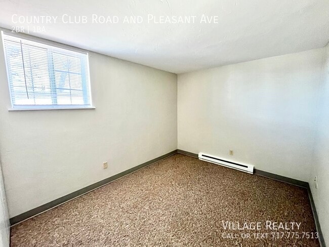 Building Photo - 605 Country Club Rd