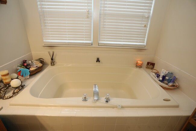 Building Photo - Available -Spacious 2 Car Garaged Townhome...