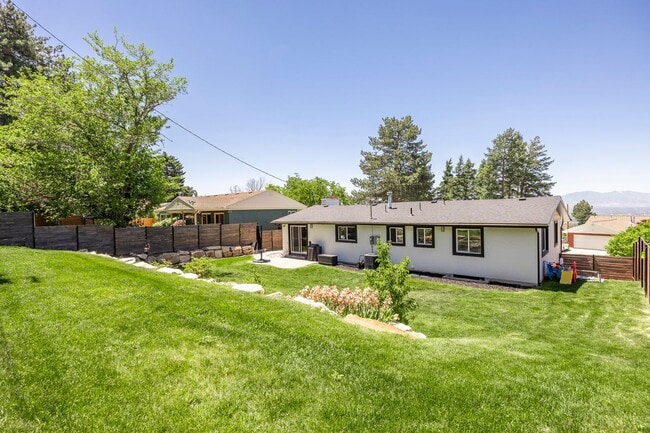 Building Photo - Exquisitely Renovated 4-Bedroom Oasis with Modern Upgrades