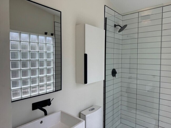 Building Photo - Vaulted Ceilings & Hardwood Floors in This Charming Indianapolis L