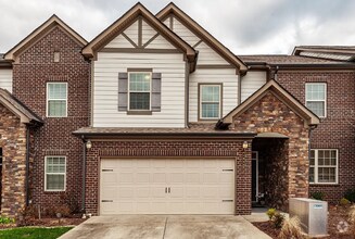 Building Photo - Upscale Modern Townhome nestled in the   G...