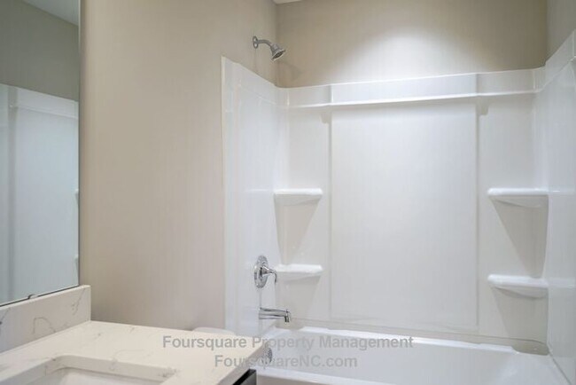 Building Photo - Modern 3-Story Townhome with Entry-Level Bonus Room, Back Deck & Garage , Community Pool in North...