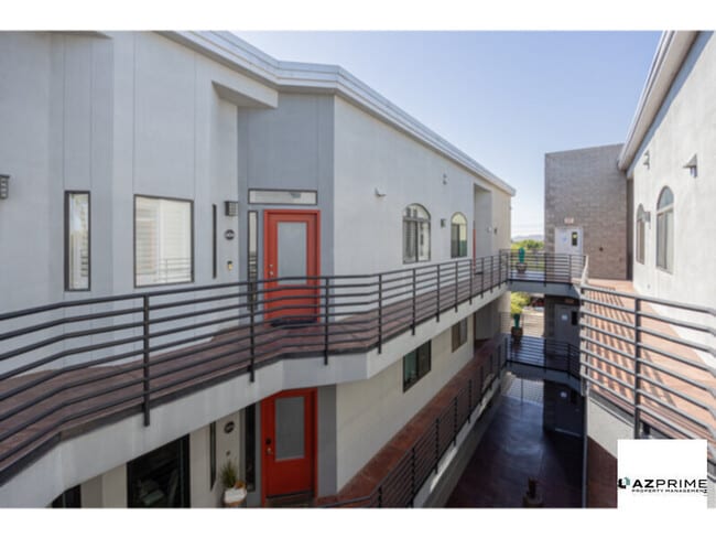 Building Photo - Top-floor living meets modern charm in thi...