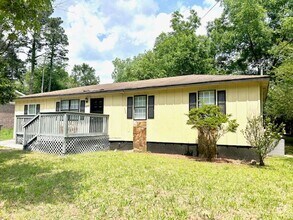 Building Photo - Spacious 4-Bedroom, 2-Bath Home Located in...