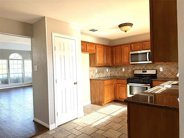 Building Photo - 8212 Tavaros Dr