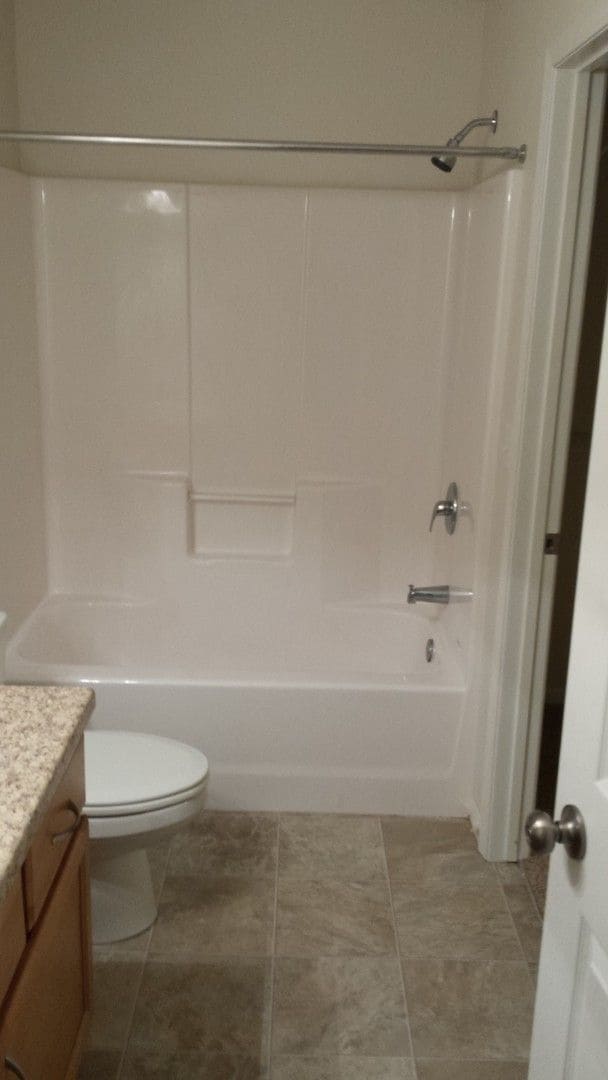 Building Photo - 3 Bedroom Townhome | Attached Double Stall Garage | Spacious