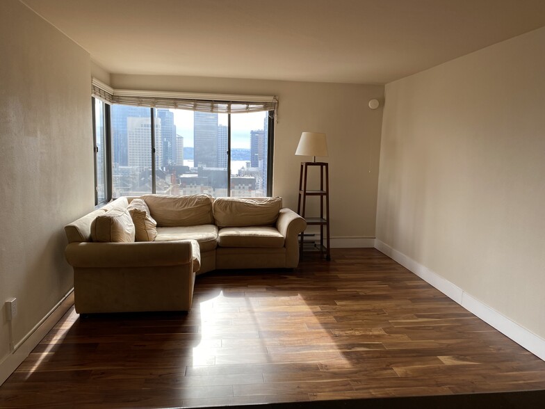 View from kitchen, hardwoods throughout, couch included if desired - 1105 Spring St