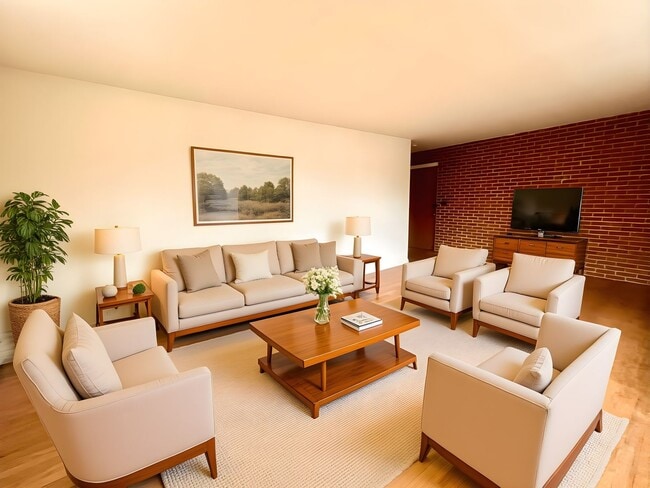 Building Photo - Mid-Century Modern 1-Bed + Den with Exposed Brick