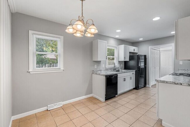 Building Photo - Updated Home with Hardwood Floors, LR & De...