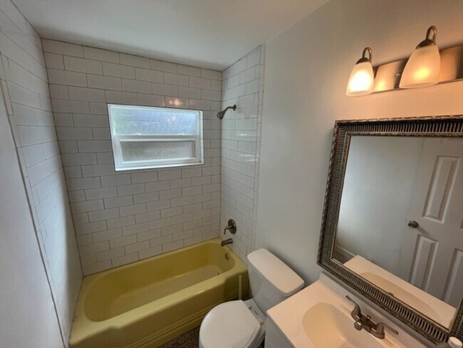 Building Photo - 2 Bedroom, 1 Bathroom Renovated Half Duplex with Private, Fenced Backyard