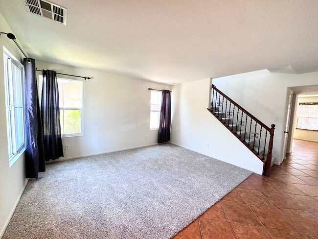 Building Photo - 4 bedroom home. New Carpet!