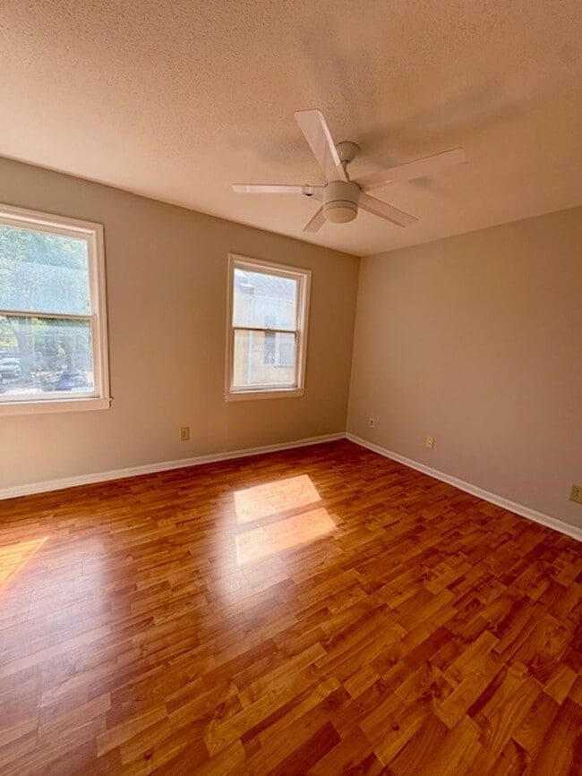 Building Photo - Charming End Unit Two Bedroom Townhome on ...