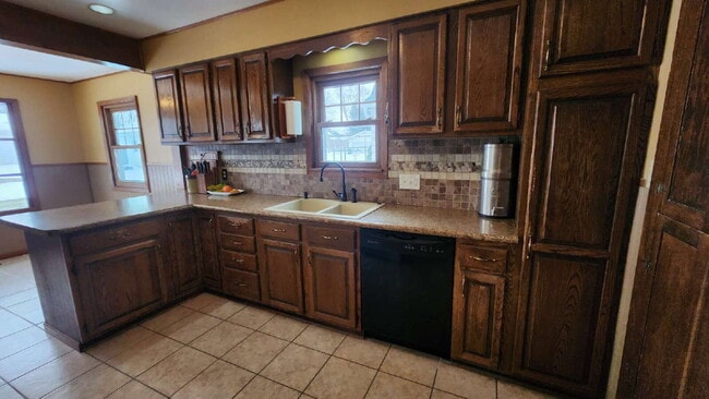 Building Photo - 4-Bedroom, 2 Bathroom Easthill Home with Bonus Room, Finished Lower Level, and Garage