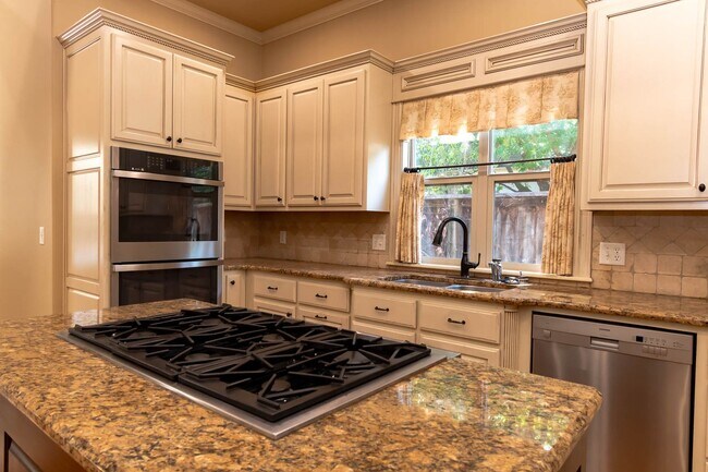 Building Photo - Rare lease opportunity in the exclusive ga...