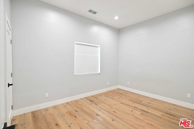 Building Photo - 6961 Balcom Ave