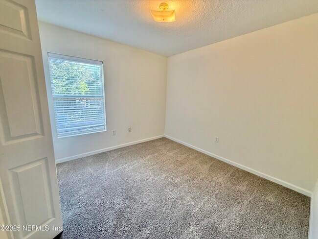 Building Photo - 6788 Manotak Oaks Dr