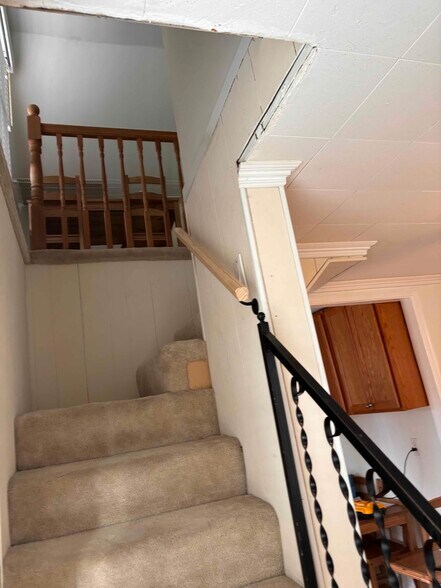 Staircase to upper room - 9100 51st Ave