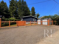 Building Photo - Walk to the Ferry from This Updated Port Orchard Home with Expansive Deck & Gated Yard
