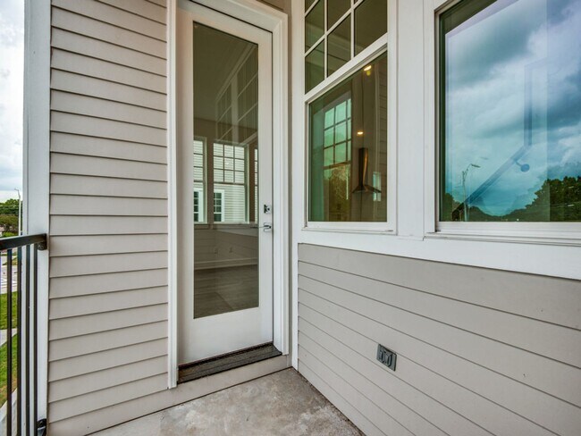 Building Photo - Welcome to a beautiful Craftsman-style end...
