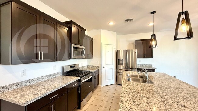 Building Photo - 40414 W Sunland Dr