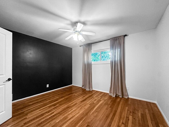 Building Photo - Charming 4BR 2BA w/ Covered Carport • In-Unit Laundry • Front Deck in Chamblee