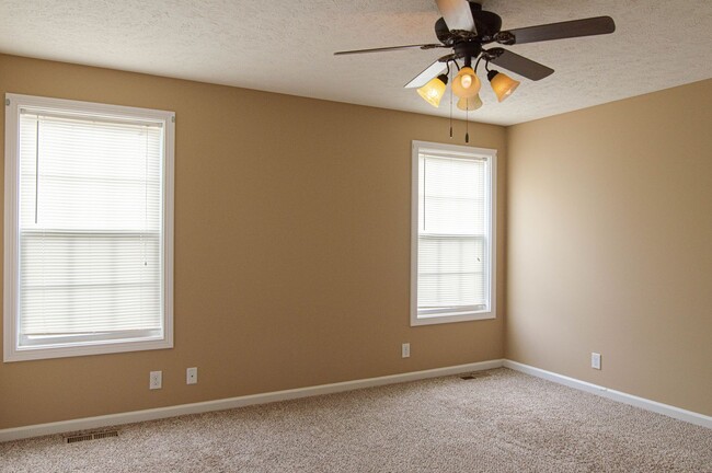 Building Photo - Pet Friendly Three Bedroom with Bonus!