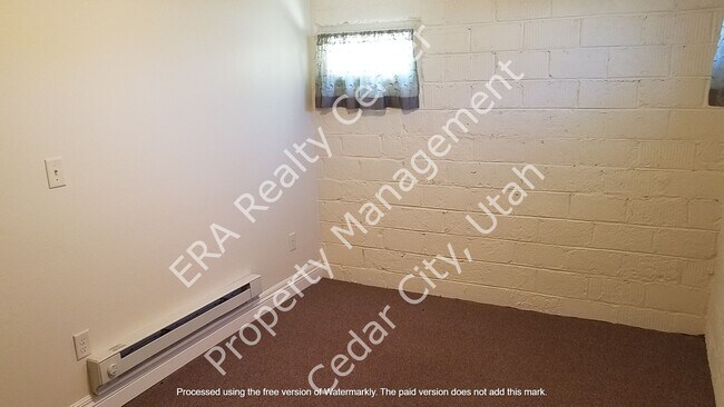 Building Photo - Move-In Discount - 2 Bedroom 1 Bath Basement Apartment of Single Family Home